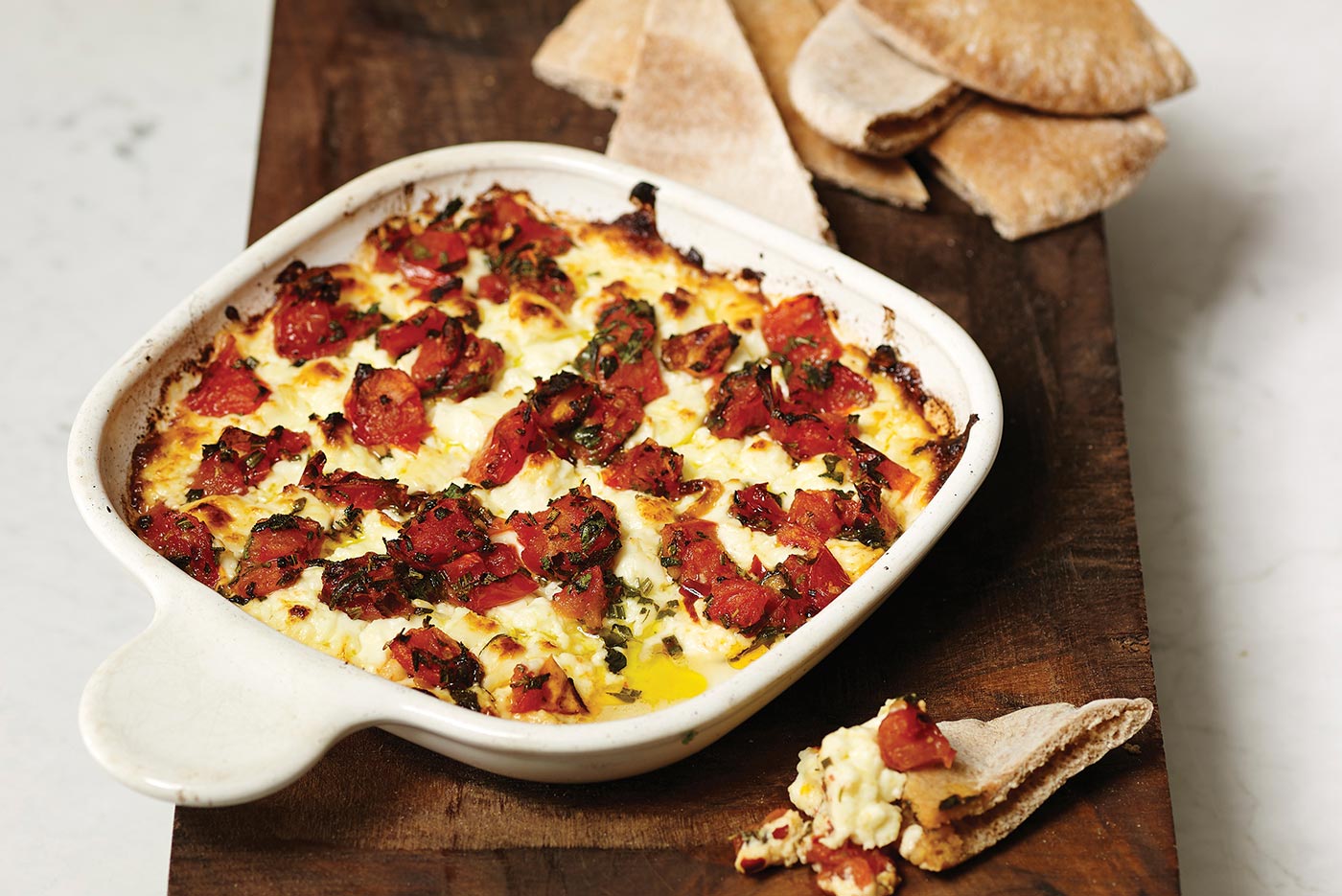 Broiled Feta with Roasted Tomatoes and Warm Pita Triangles